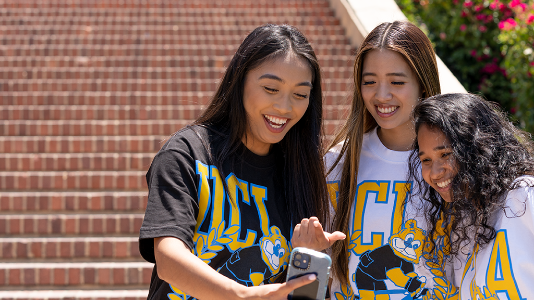 UCLA students in Bruin merchandise.