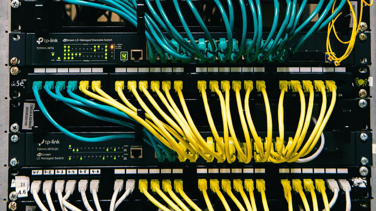 Well organized, multicolored ethernet cables.