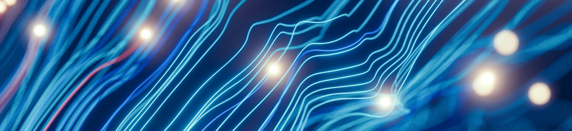 Digital graphic of glowing blue lines and lights on dark background.